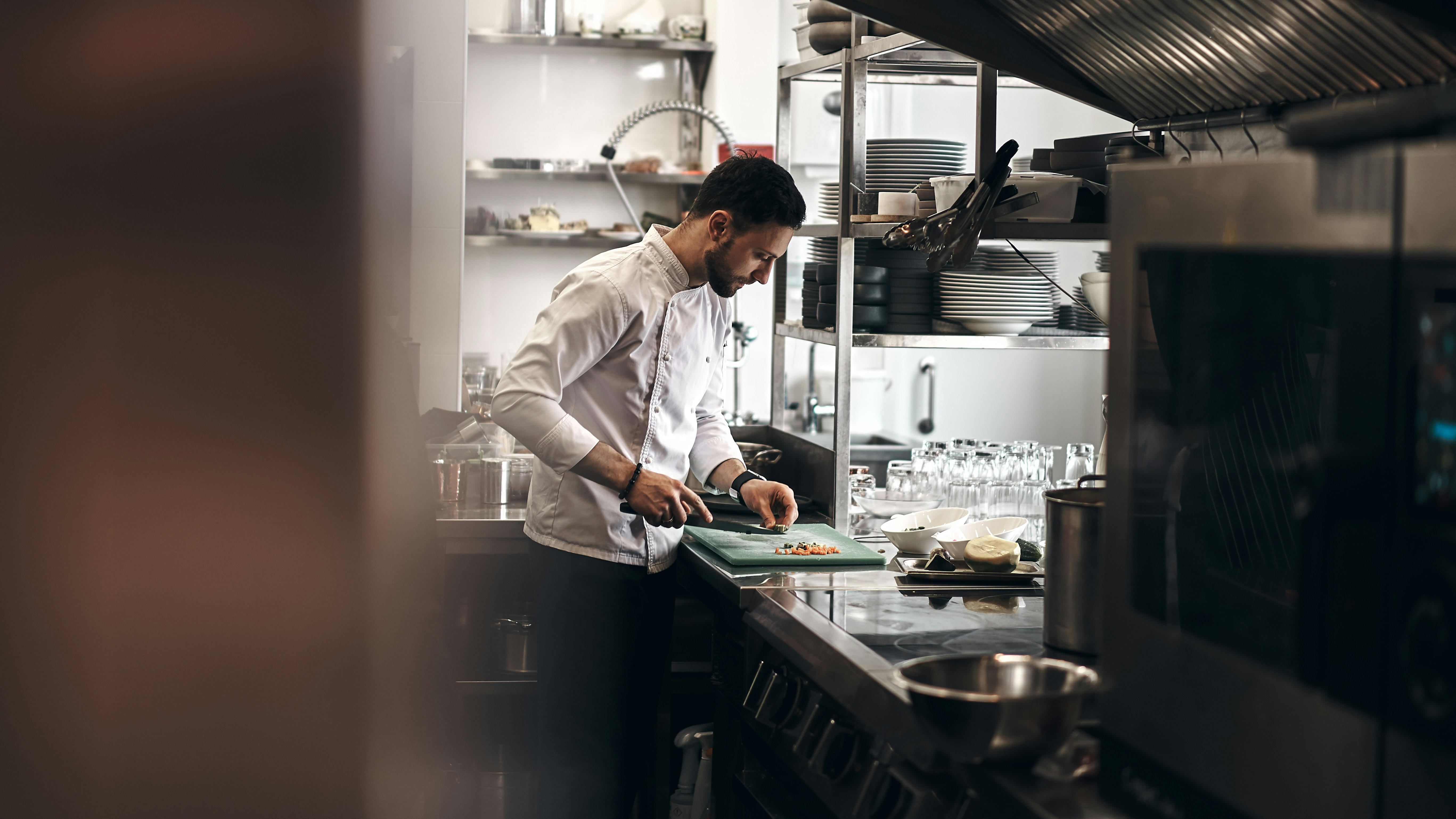 Kitchen team preparing dishes